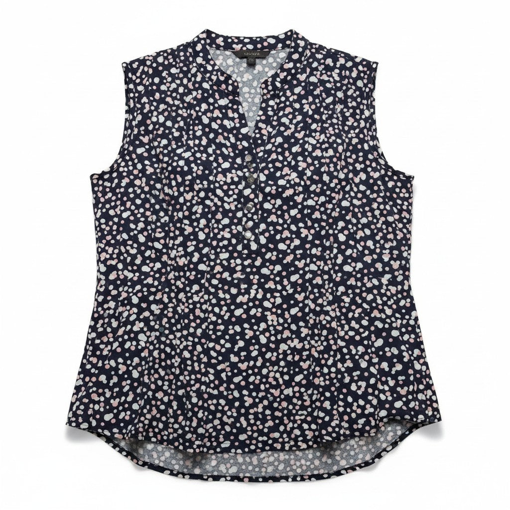 A sleeveless button-front top with a small-scale floral or ditsy print in white and light pink on a dark navy background, shown flat against a white background.