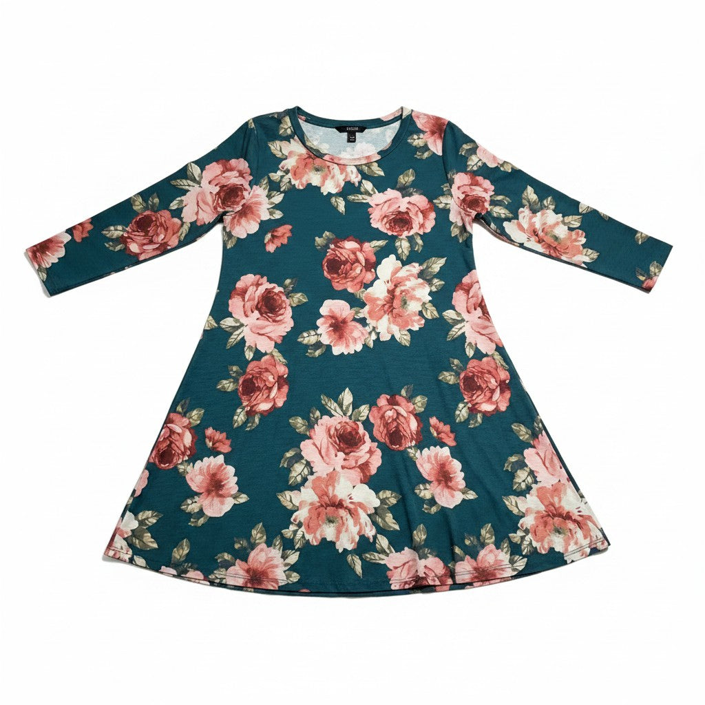 A long-sleeve A-line dress with a dark teal green background and an all-over floral print of pink and red roses with green leaves, shown flat on a white background.