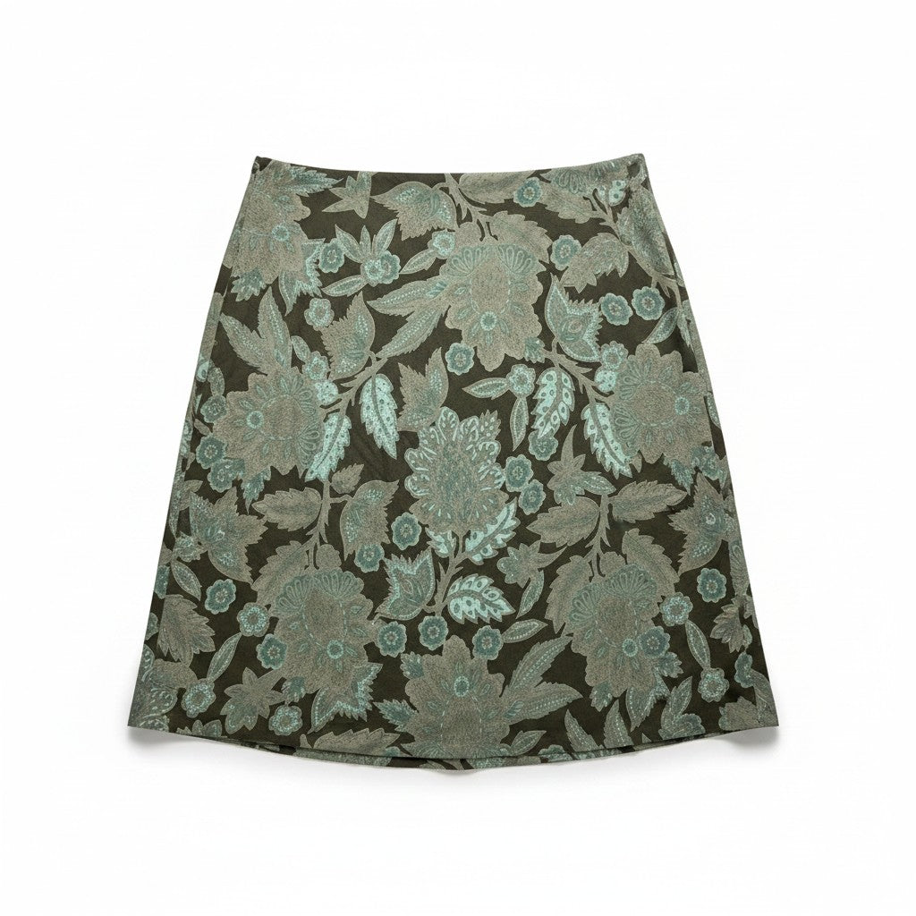 An A-line skirt featuring an intricate floral damask pattern in sage green and beige over a dark brown base, shown flat against a white background.