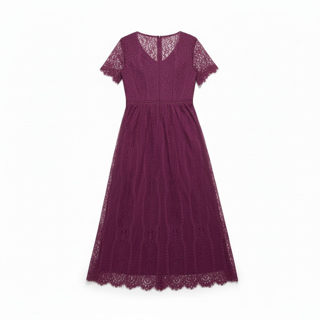 A woman viewed from the back wearing a short-sleeve midi dress in deep burgundy lace, paired with black strappy heels, against a light gray studio background.