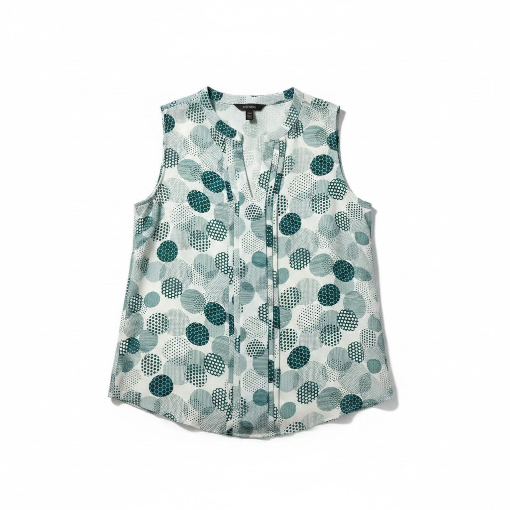 A sleeveless button-front blouse with a V-neckline, featuring an all-over abstract polka dot pattern in shades of teal and dark green on a white background.