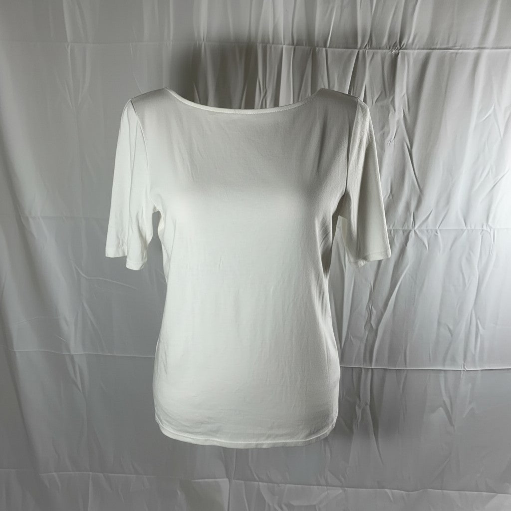 A white short-sleeve scoop-neck t-shirt displayed against a wrinkled white fabric backdrop.