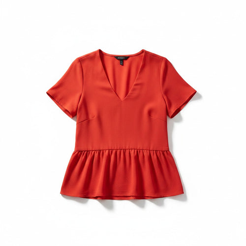 Red blouse with a peplum waist on a white background