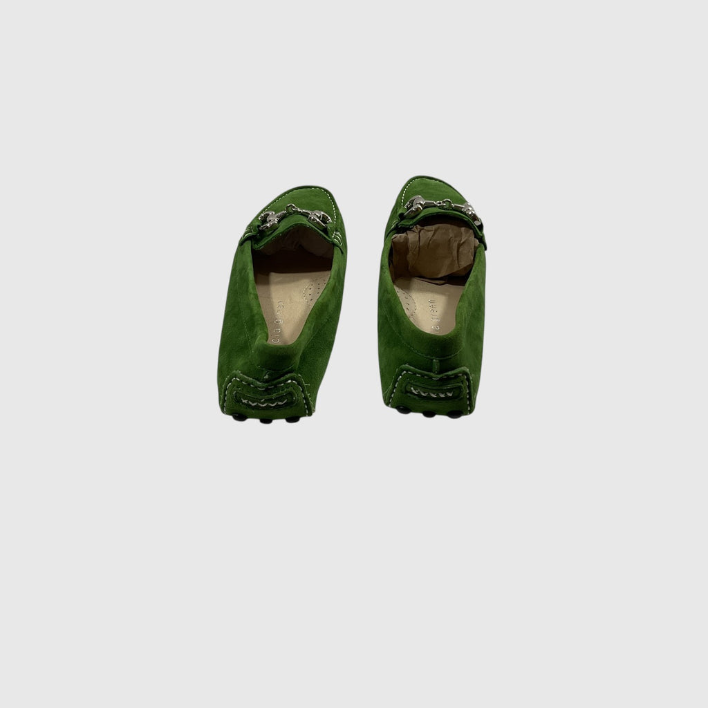 A pair of green suede loafer-miocas with silver-tone horsebit hardware, shown from two angles (side and top-down) against a light gray background.