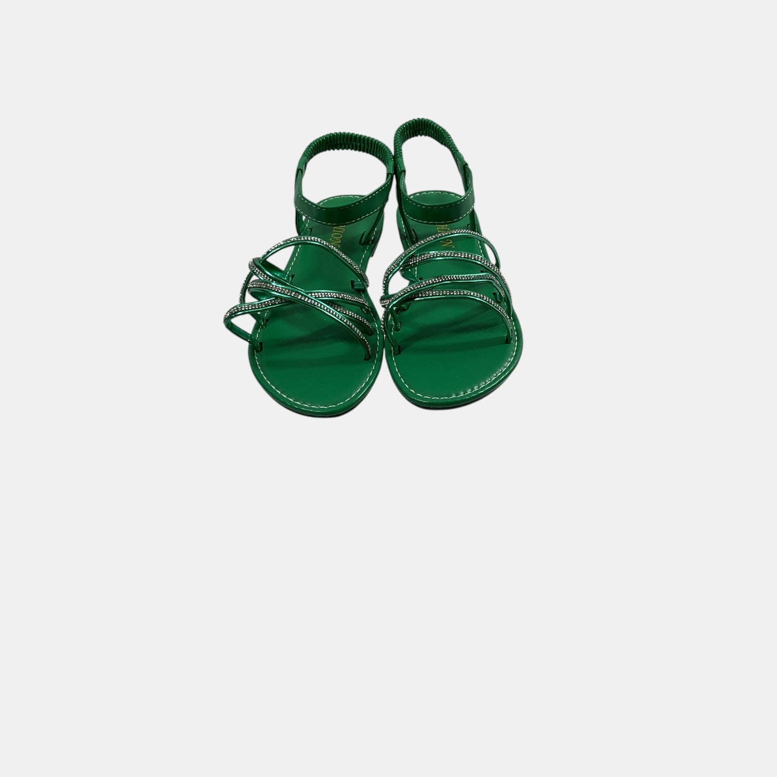 green sandal with rhinestones on a white background