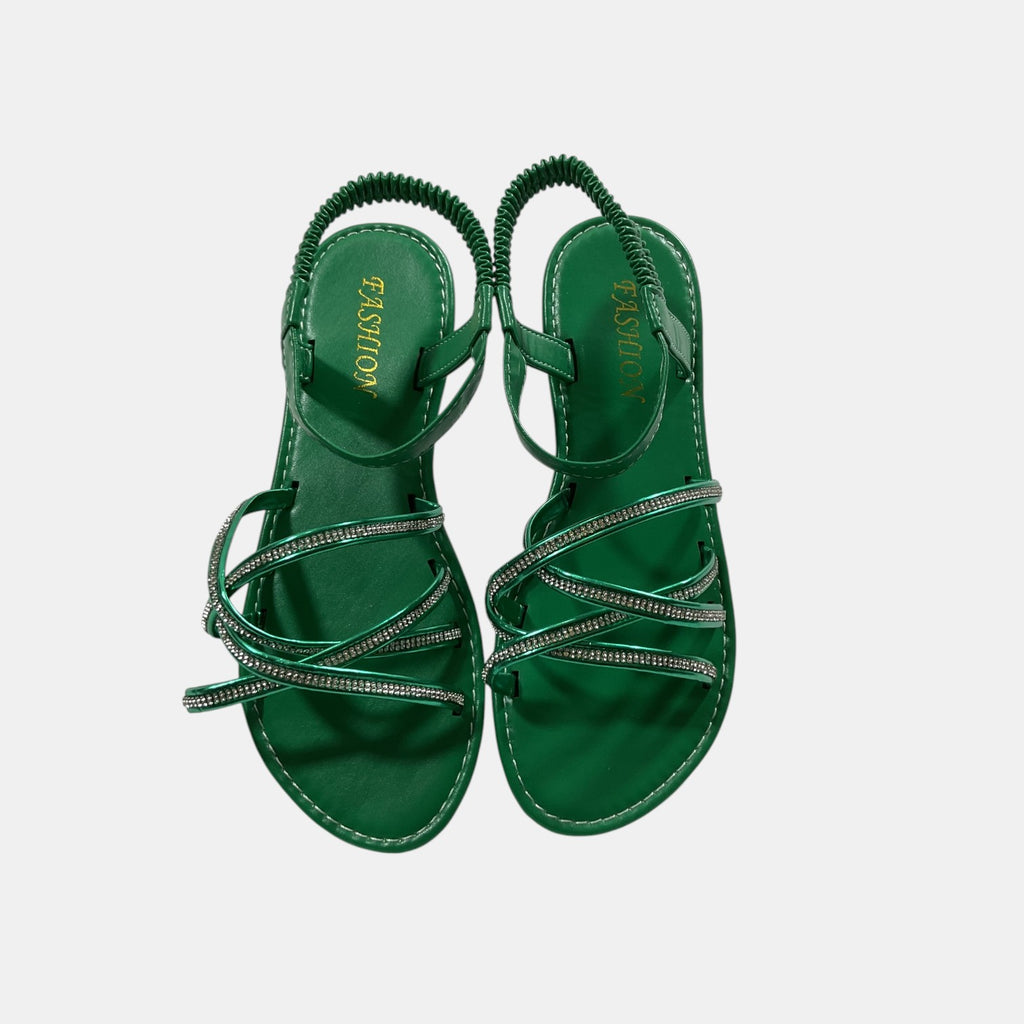 green sandal with rhinestones on a white background