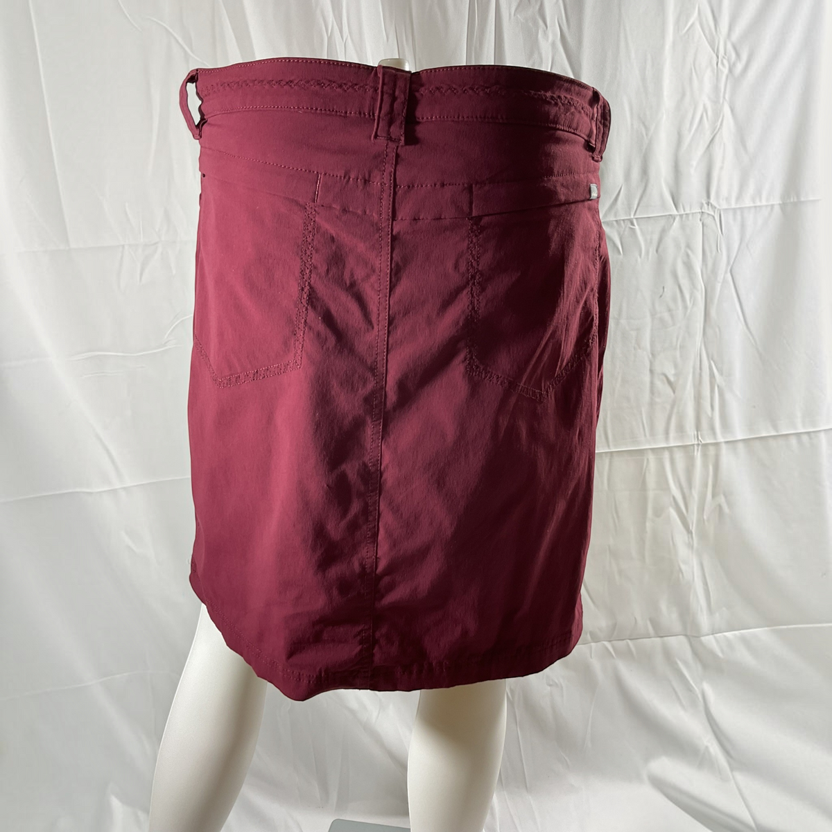 A burgundy skirt on a light background