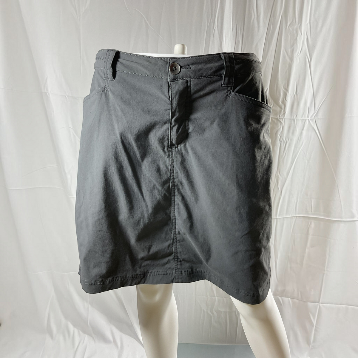 a  gray skirt on a light background