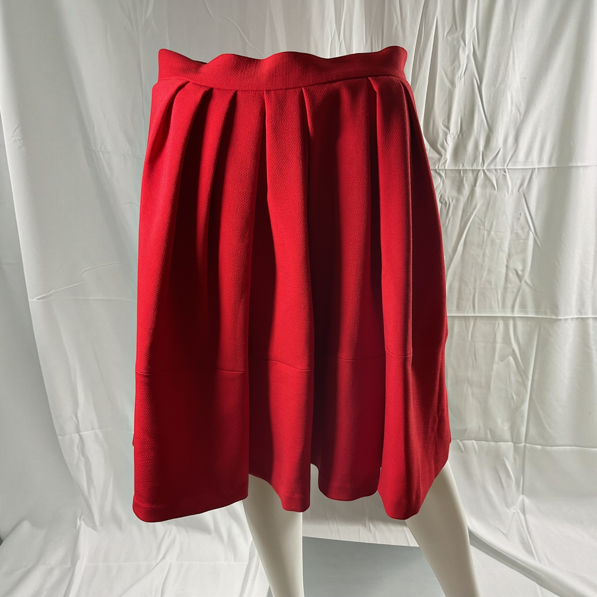 The Solid High-Waist Box Pleat Patch Pocket Full A-Line Midi Skirt in Vivid Crimson Red on a light gray background