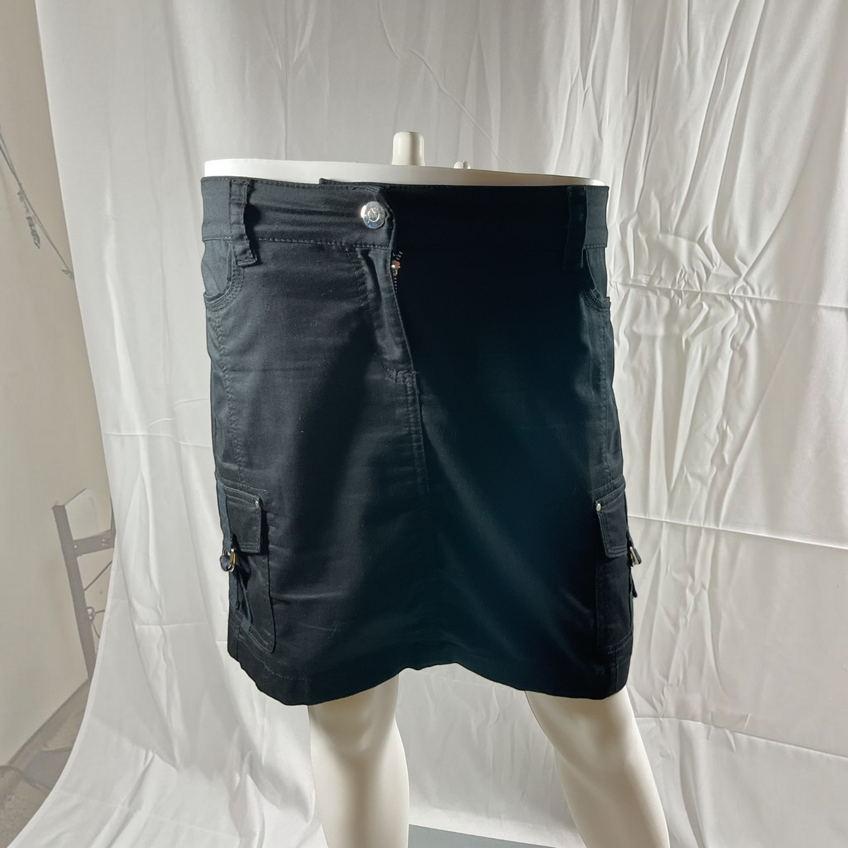 a black skirt on a light gray background