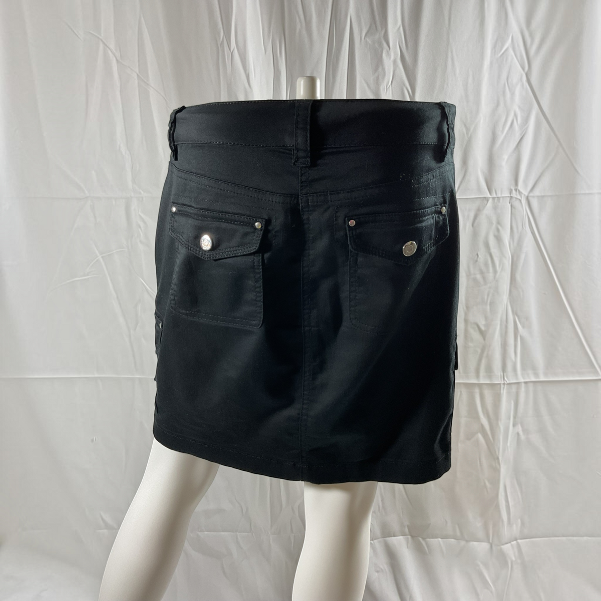 a black skirt on a light gray background