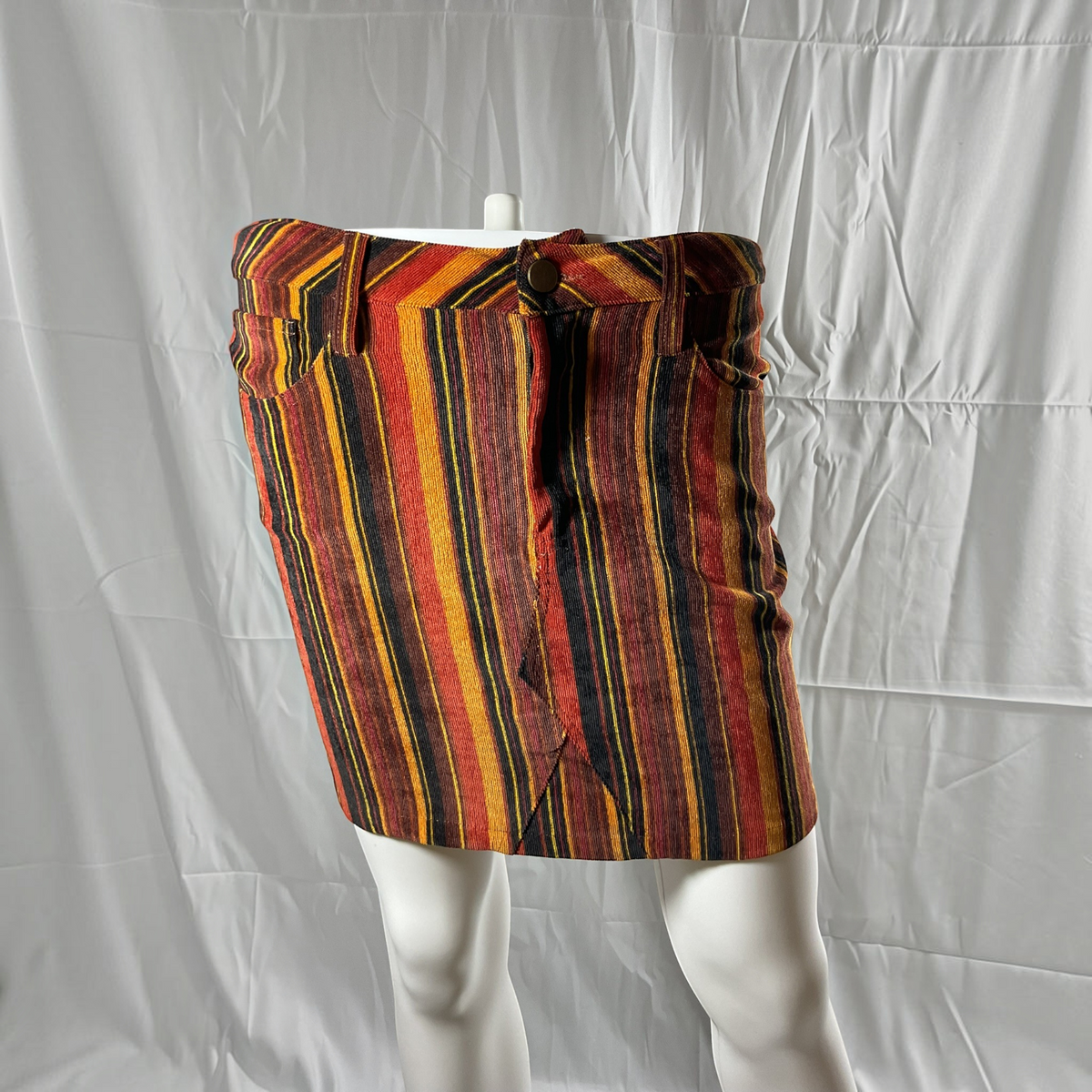 a strip skirt on a light gray background