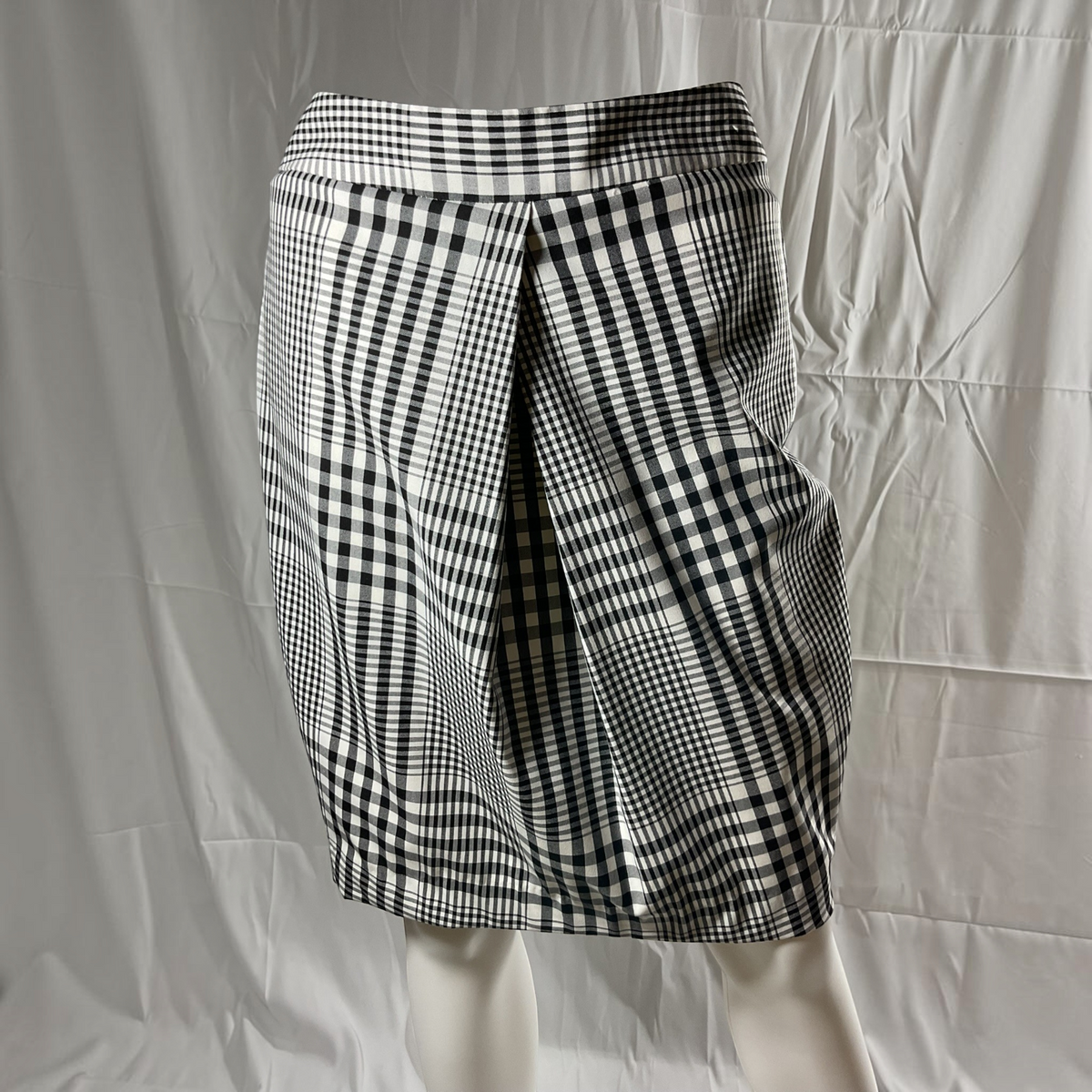 A black and white skirt on a light gray background