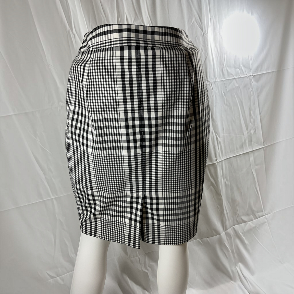 A black and white skirt on a light gray background