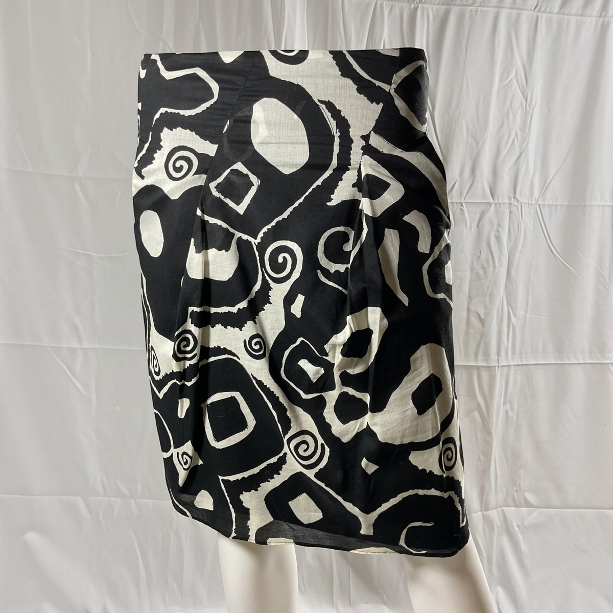 A black and white skirt on a light gray background