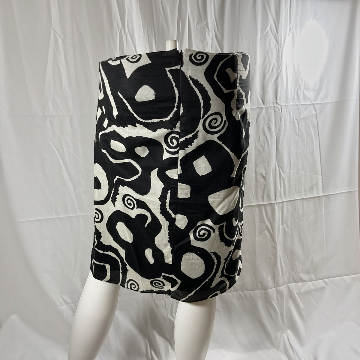 A black and white skirt on a light gray background