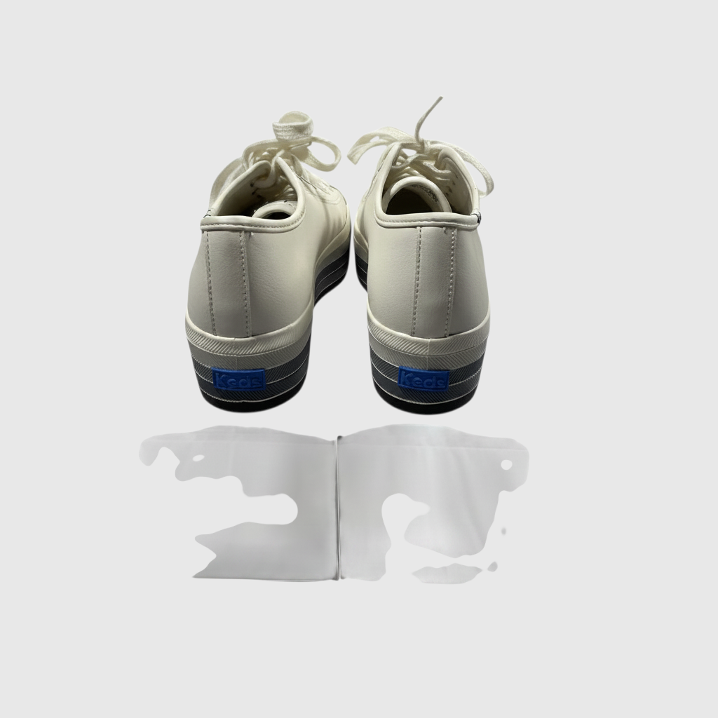 A pair of white low-top lace-up shoes shown from the back on a light gray background, with a faint mirrored reflection below.