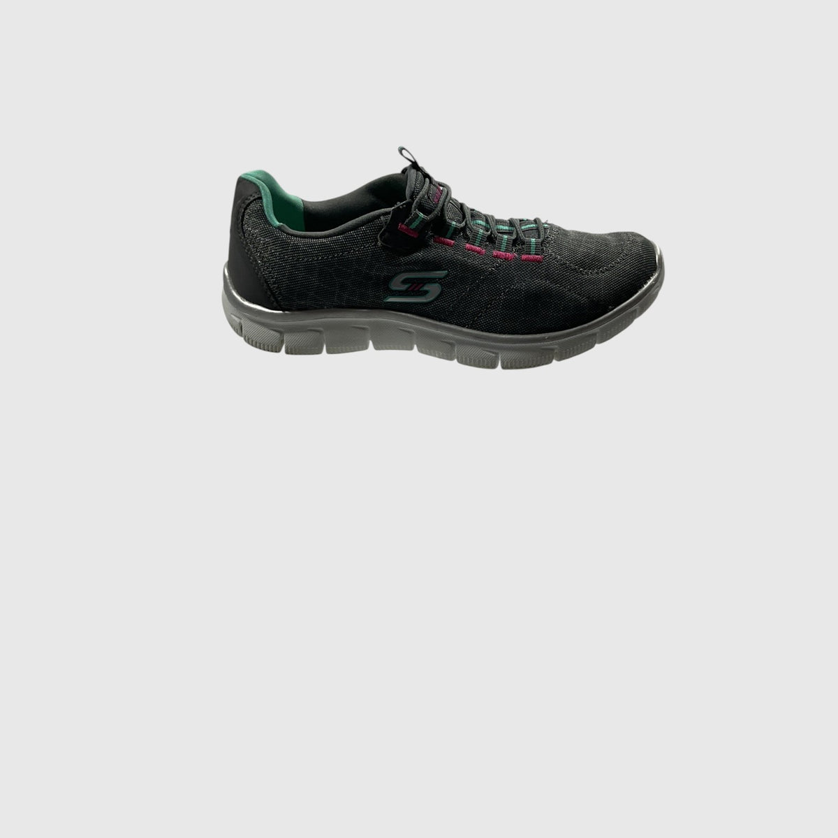 A gray, pink, and turquoise sneaker on a light gray background.