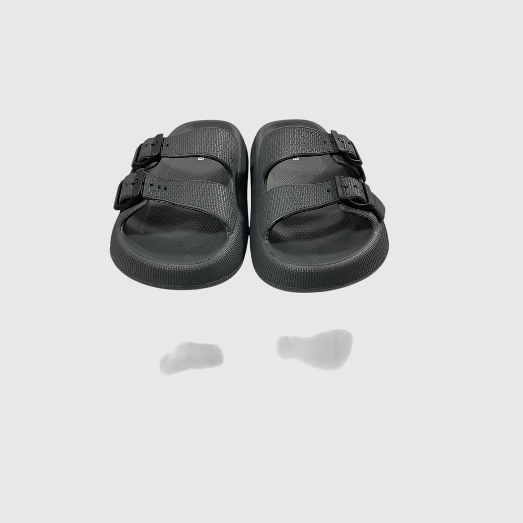 A pair of black slides on a light gray background.