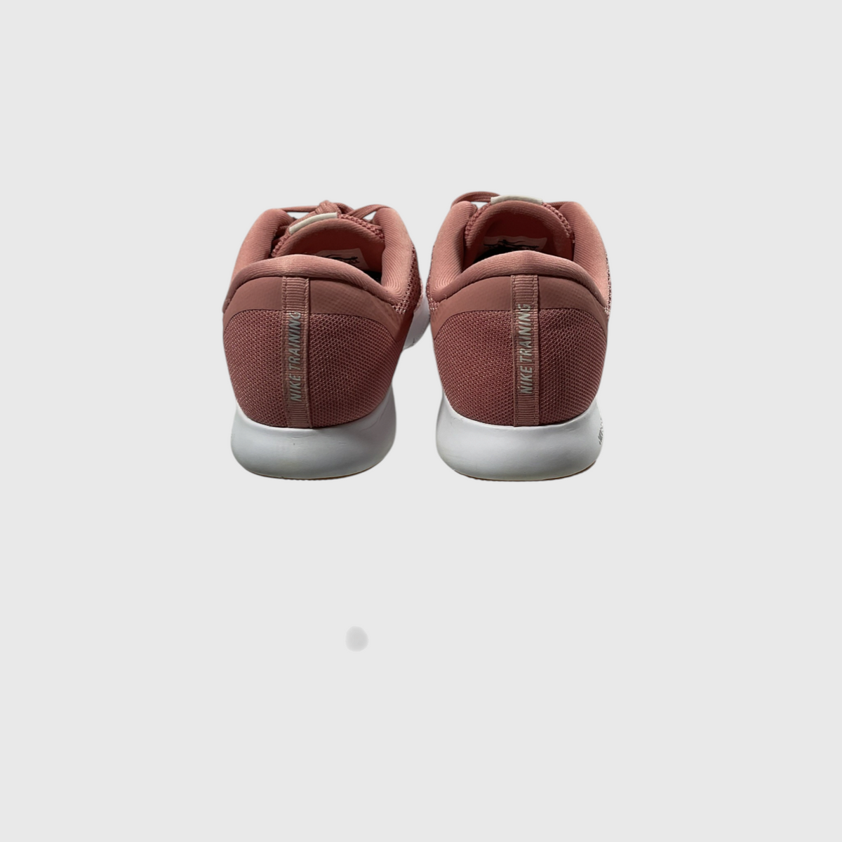 A pair of Nike Air Max 2013 sneakers shown from the back, featuring a dusty rose mesh upper and a white midsole, set against a light gray background.