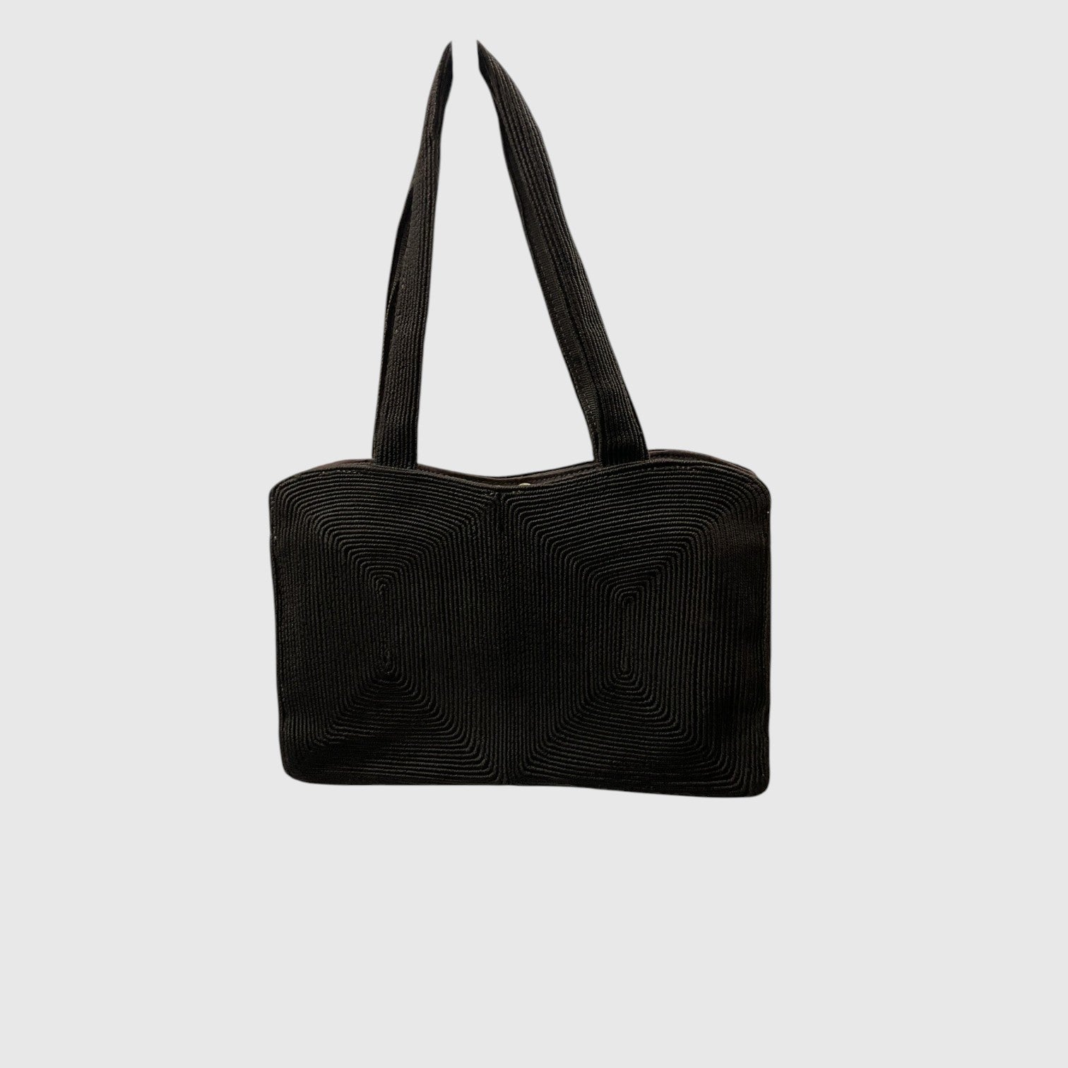 A black textured shoulder bag with a ribbed, corduroy-like surface and two long shoulder straps, shown against a light gray background.