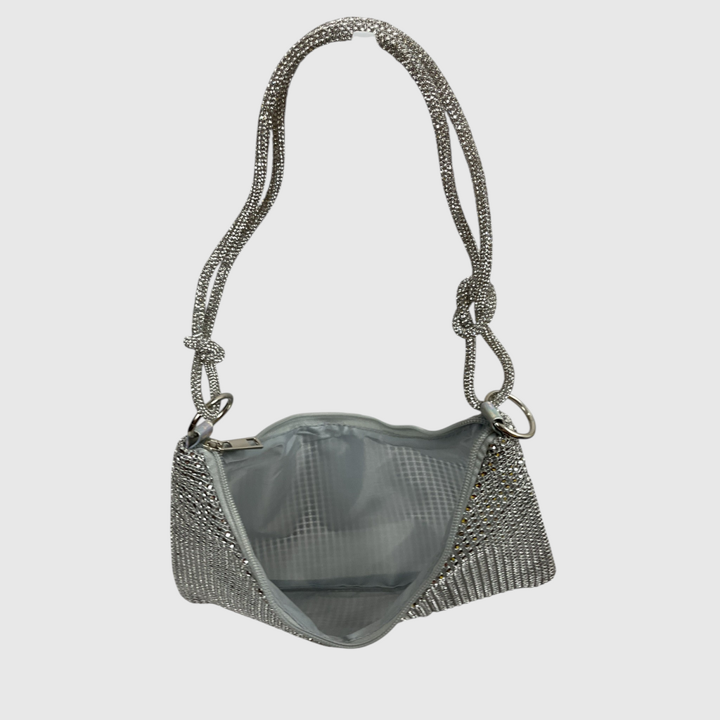 A silver rhinestone-embellished shoulder bag with a matching chain strap, shown open against a light gray background.