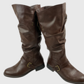 A pair of dark brown faux-leather slouchy knee-high boots with buckle straps on the sides, shown against a plain light gray background.