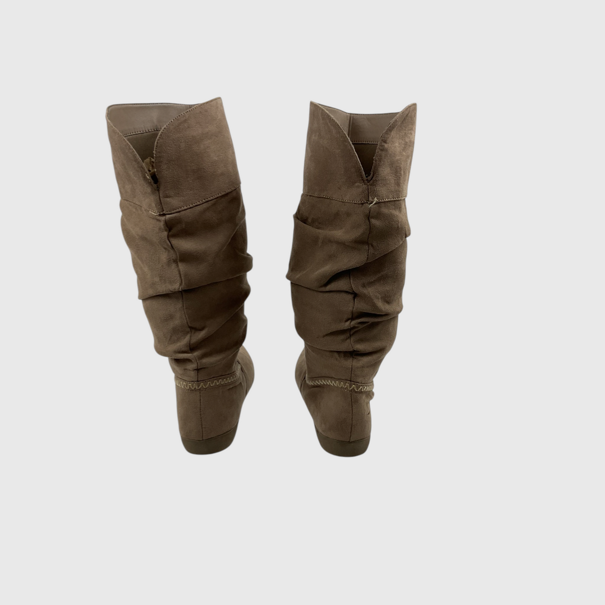 A pair of mid-calf boots in a taupe brown suede-like material, shown from the back against a light gray background.